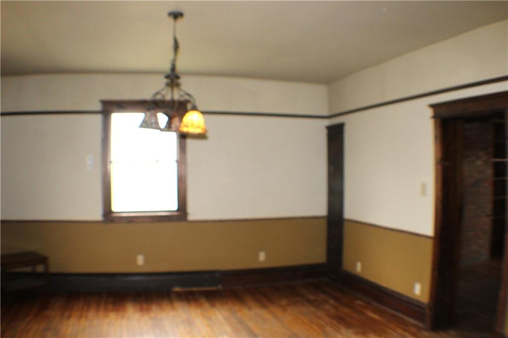 221 Ferguson Lane Perryopolis, PA 15473 - Photo 7 of 37 Big dining room with 3 light chandeliers