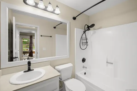 a view of a road with trees in the background