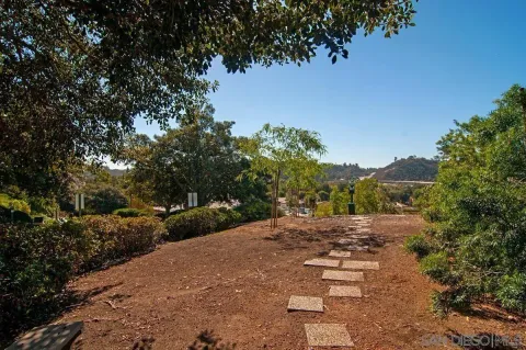 a view of a building with a street