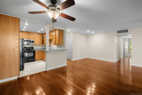 a view of kitchen with wooden floor