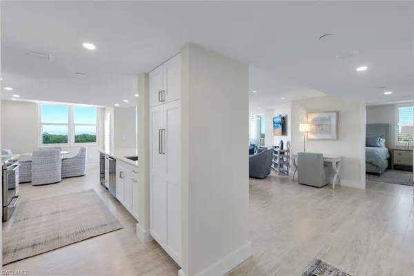 a room with furniture and a view of bathroom