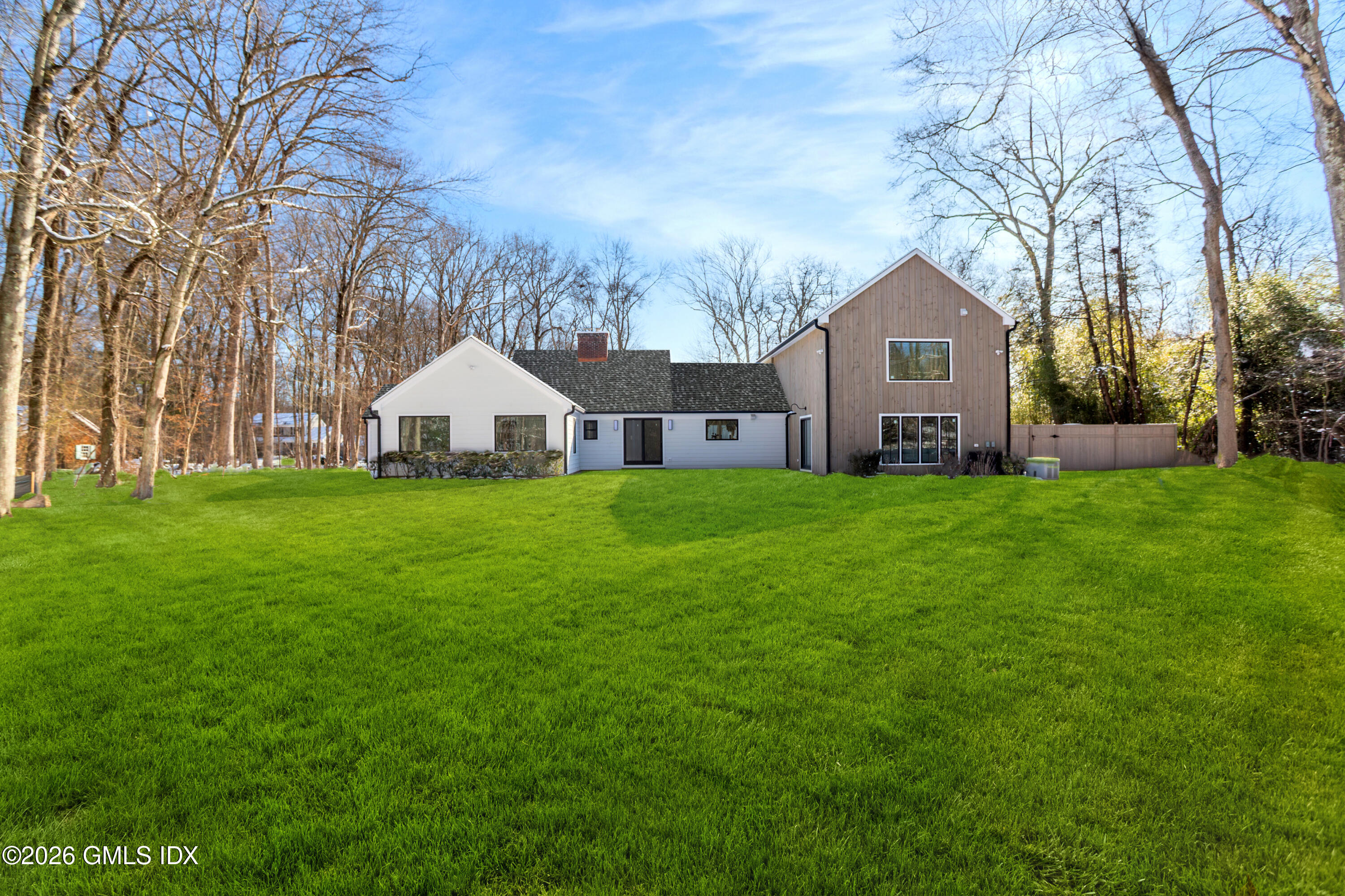 49 Salisbury Road Darien, CT 06820 - Photo 2 of 40 a view of a house with a yard
