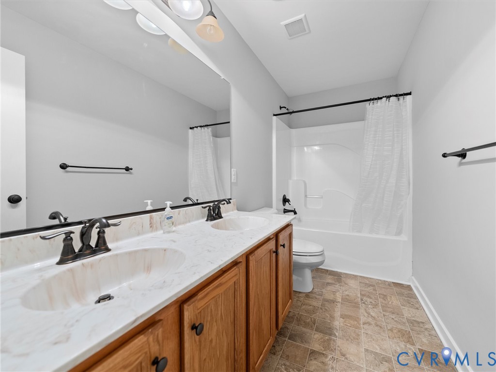 2094 Hancock Road Powhatan, VA 23139 - Photo 14 of 33 Guest bath, double vanity, shower and tub