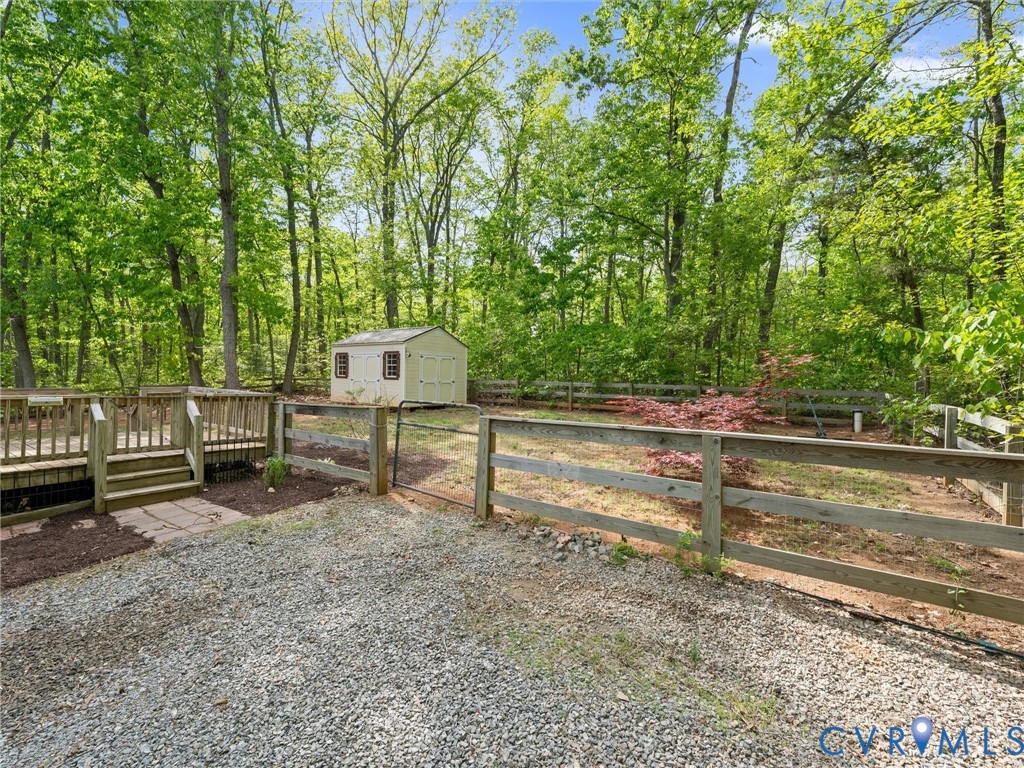 2094 Hancock Road Powhatan, VA 23139 - Photo 30 of 33 Fenced backyard and storage shed