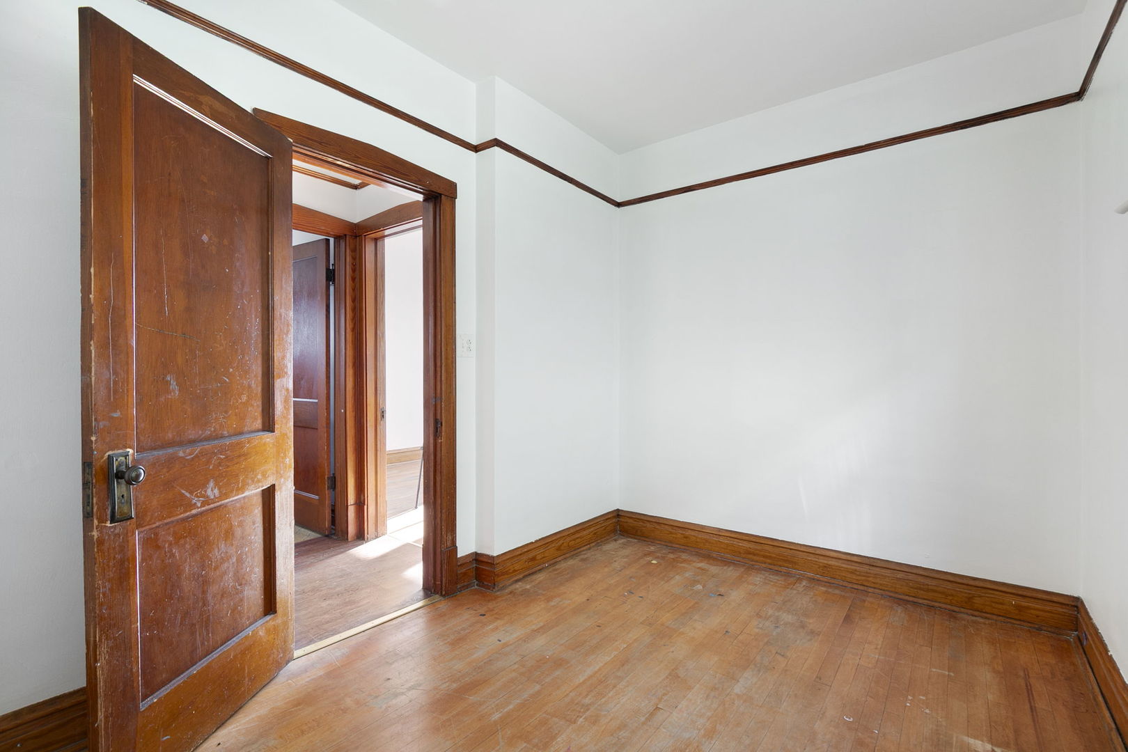 3128 West 41st Street Chicago, IL 60632 - Photo 17 of 36 a view of a room with wooden floor