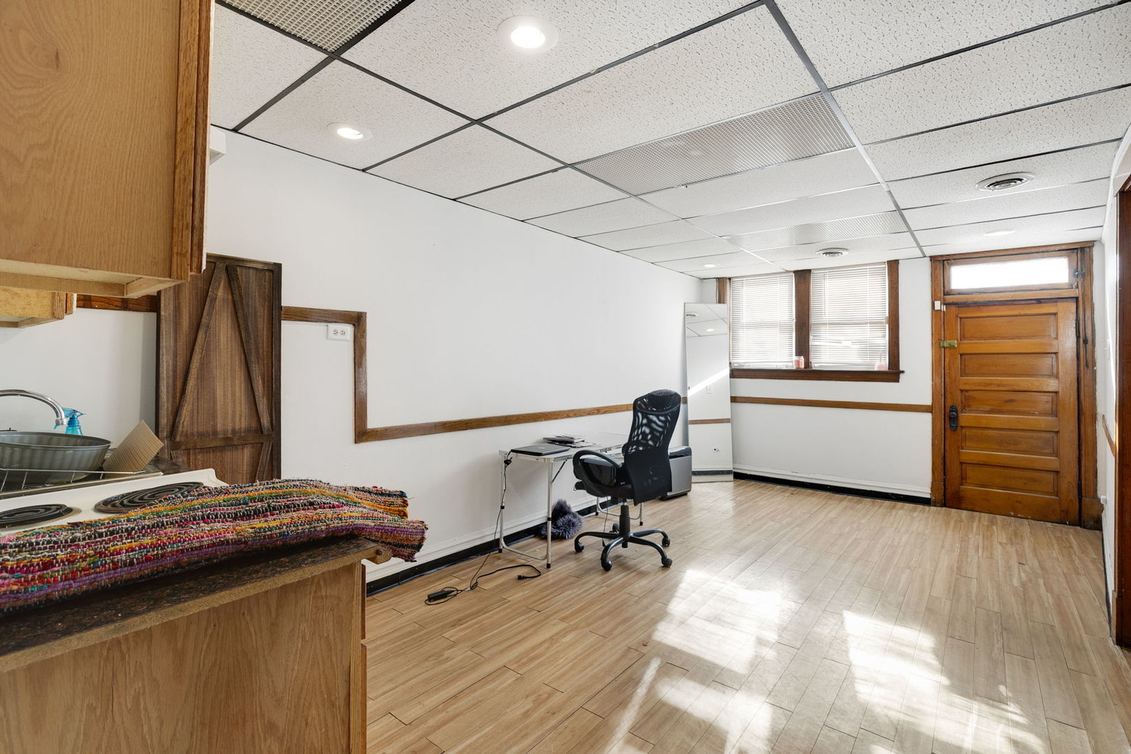 3128 West 41st Street Chicago, IL 60632 - Photo 23 of 36 a view of a workspace with furniture and a window