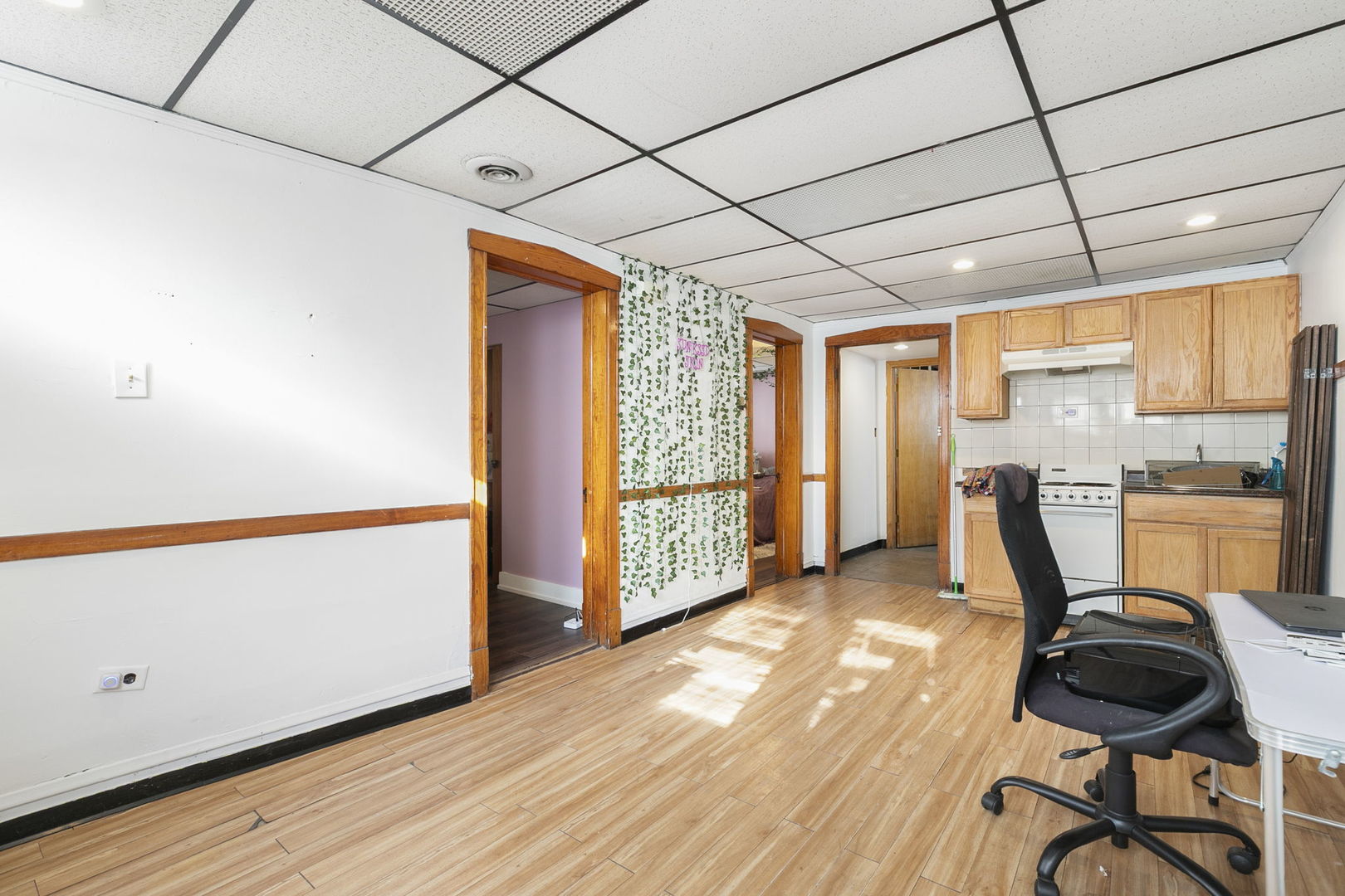 3128 West 41st Street Chicago, IL 60632 - Photo 25 of 36 a view of a room with furniture window and wooden floor