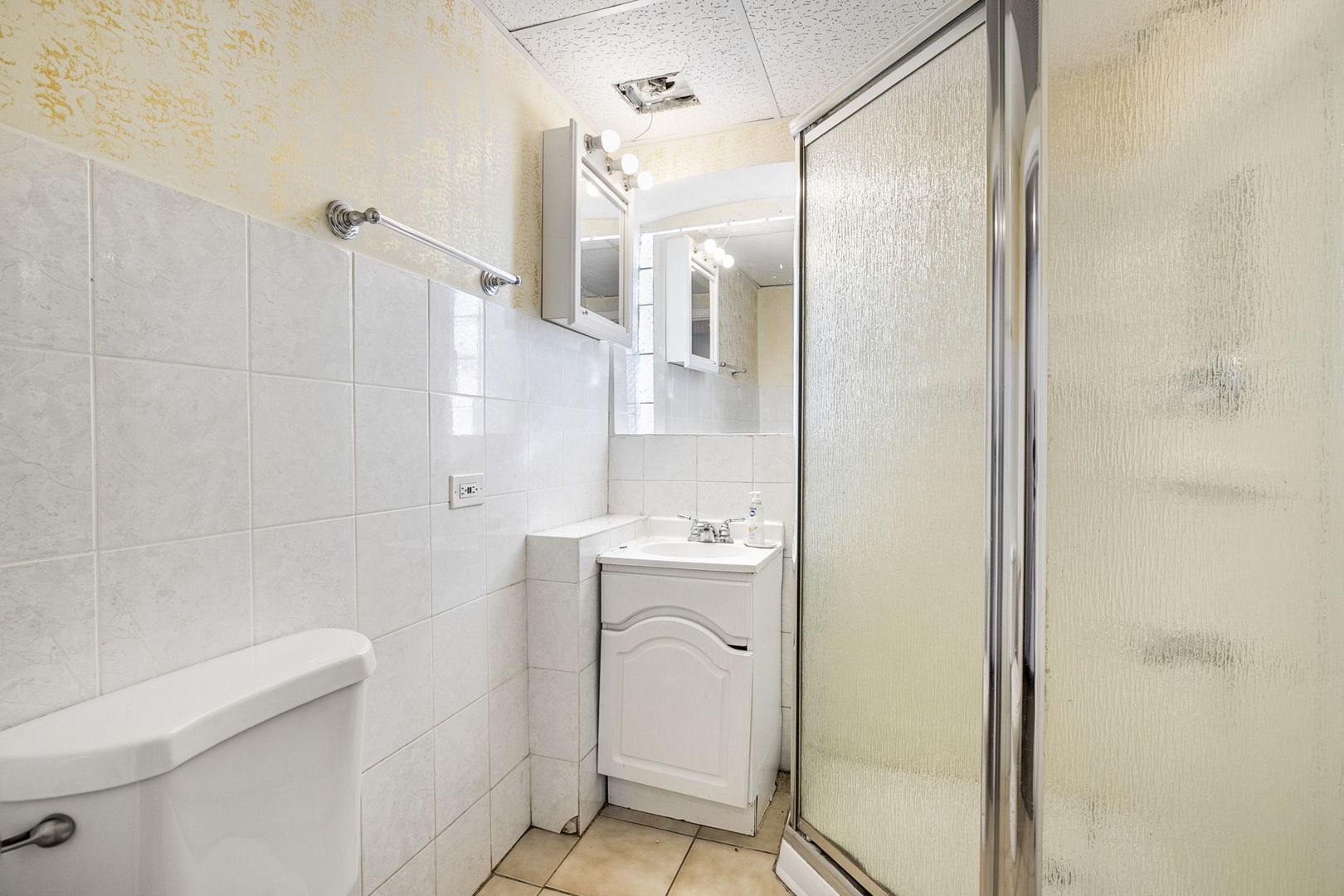 3128 West 41st Street Chicago, IL 60632 - Photo 28 of 36 a bathroom with a shower and a toilet