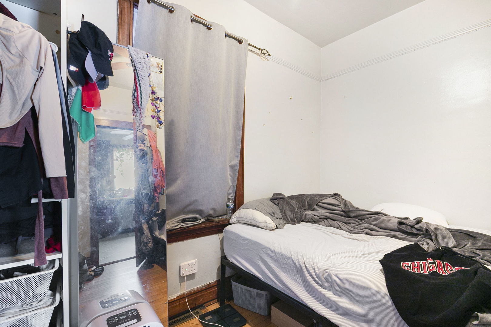 3128 West 41st Street Chicago, IL 60632 - Photo 6 of 36 a bedroom with a bed and a flat screen tv