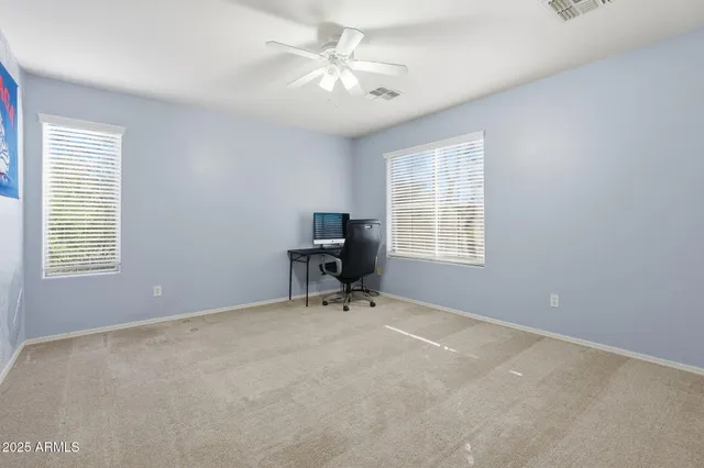 a view of a city with mountains in the background