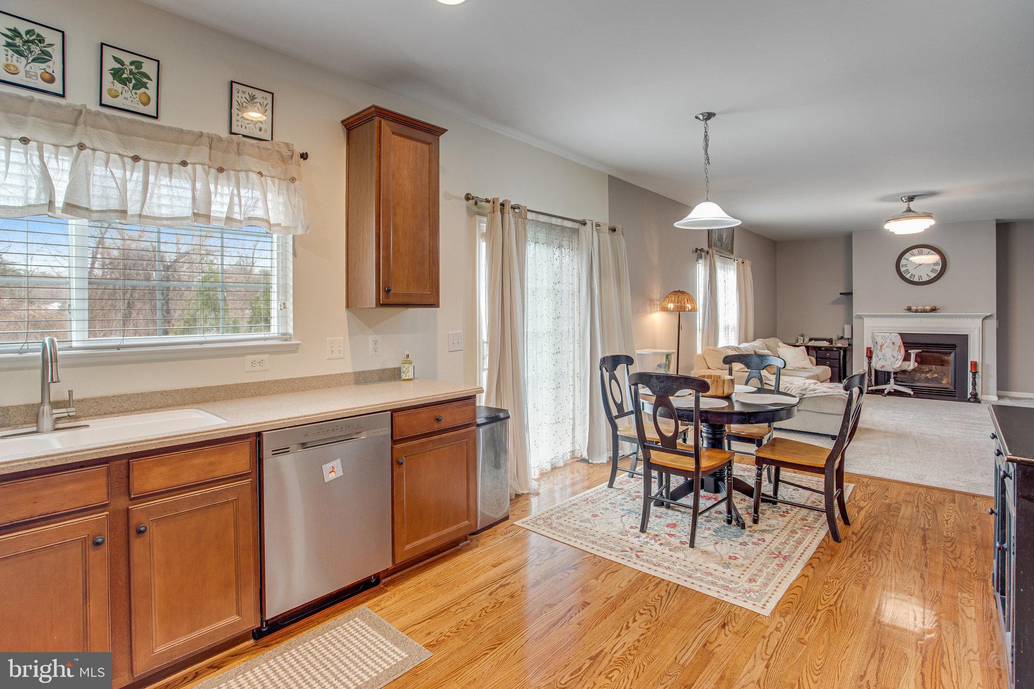 4287 Meyers Road Triangle, VA 22172 - Photo 13 of 51 a view of a dining room with furniture window and wooden floor