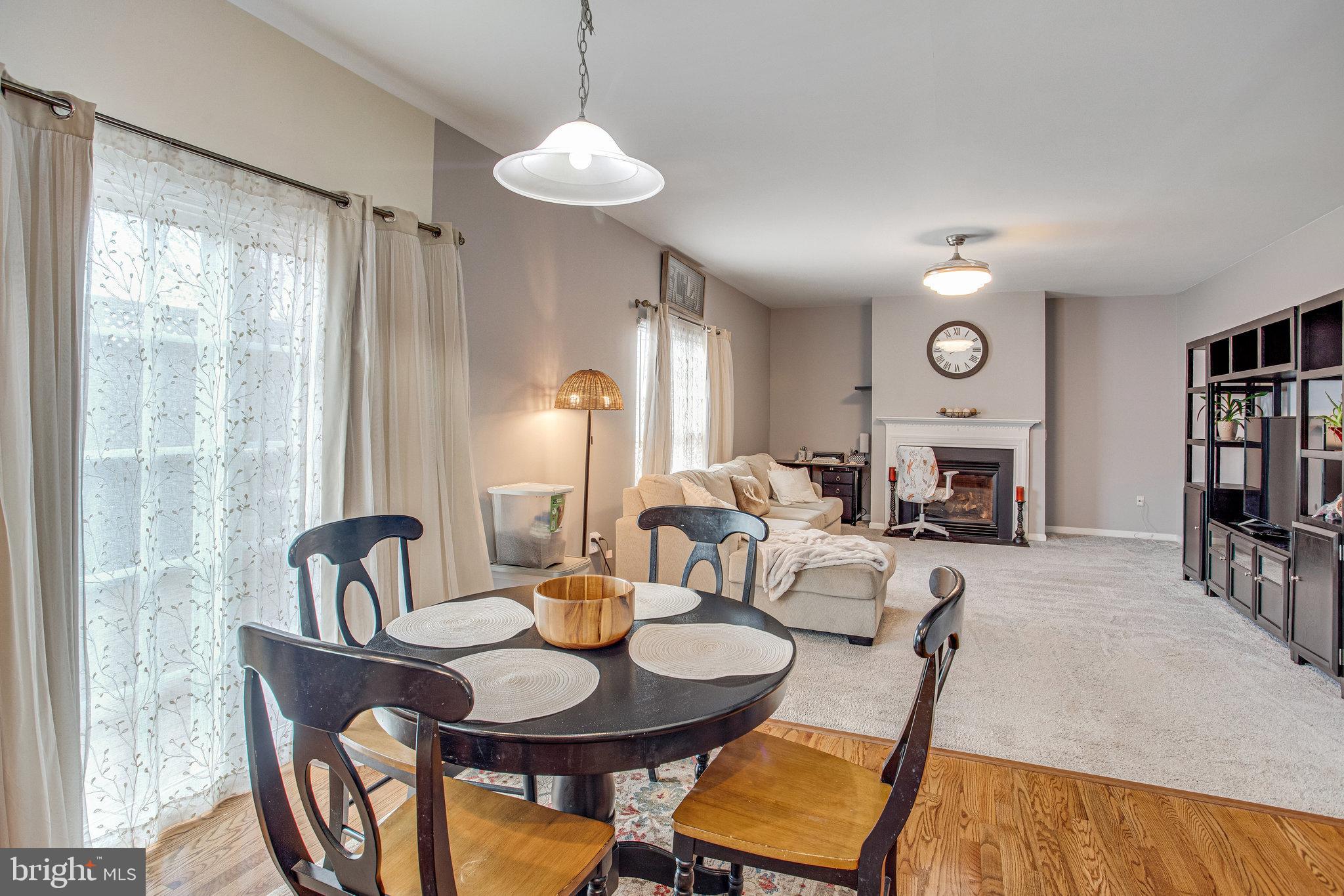4287 Meyers Road Triangle, VA 22172 - Photo 14 of 51 a view of a dining room with furniture window and wooden floor