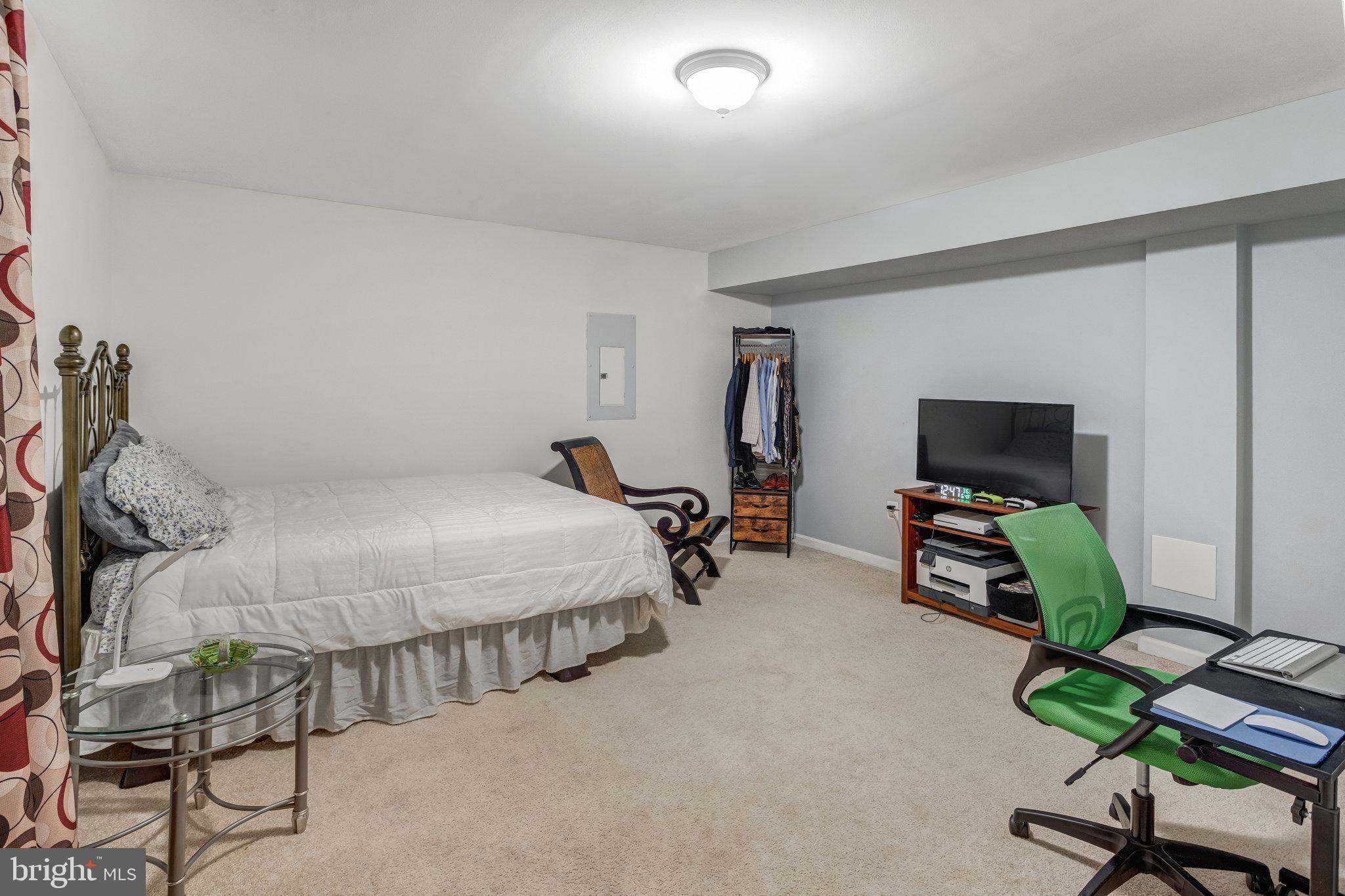 4287 Meyers Road Triangle, VA 22172 - Photo 36 of 51 a bedroom with furniture and a bed