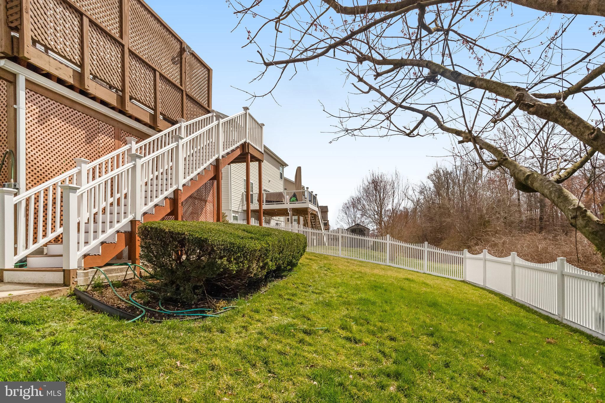 4287 Meyers Road Triangle, VA 22172 - Photo 47 of 51 a view of a house with a yard