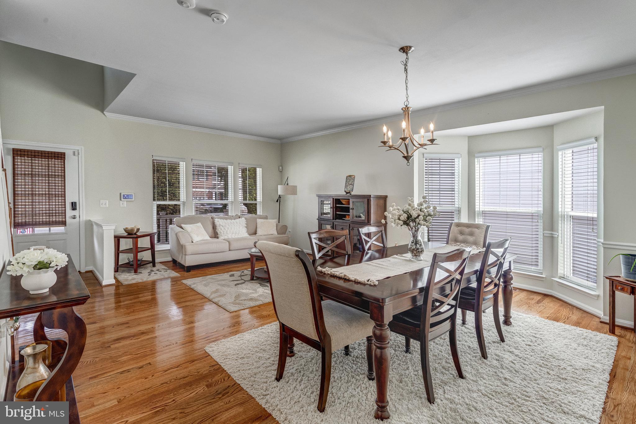 4287 Meyers Road Triangle, VA 22172 - Photo 6 of 51 a view of a dining room with furniture window and wooden floor