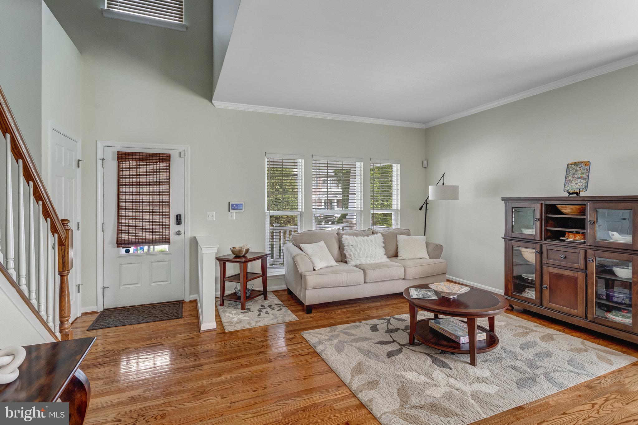 4287 Meyers Road Triangle, VA 22172 - Photo 9 of 51 a living room with furniture and a wooden floor