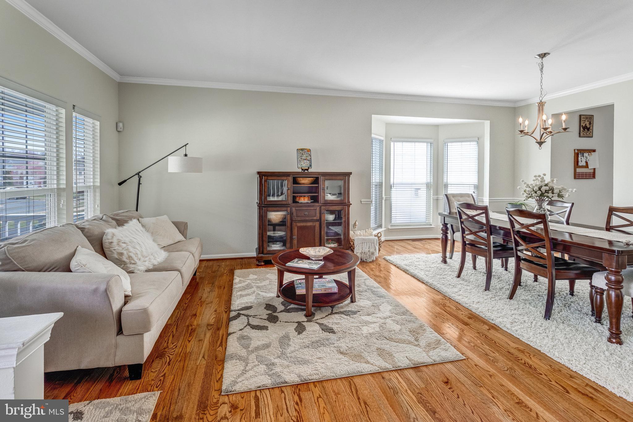 4287 Meyers Road Triangle, VA 22172 - Photo 10 of 51 a living room with furniture and wooden floor