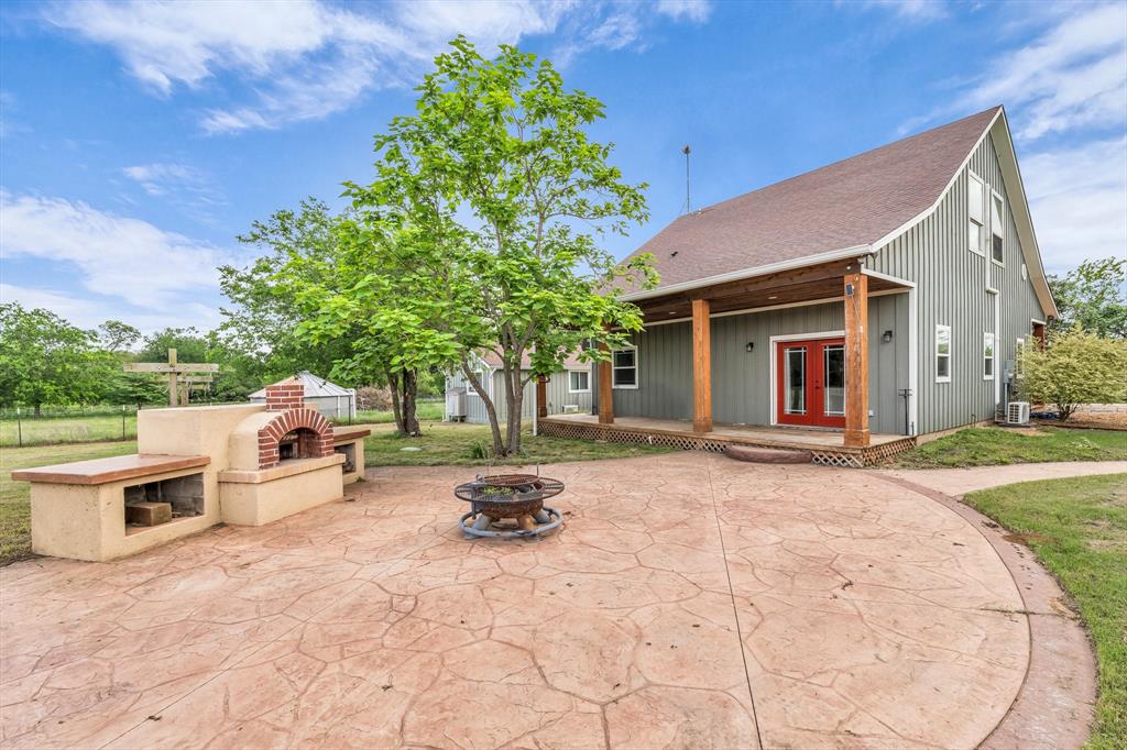 348 Barker Lane Waco, TX 76705 - Photo 22 of 39 a view of a house with backyard and sitting area