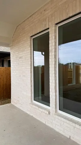 a kitchen with stainless steel appliances granite countertop a sink a stove and refrigerator