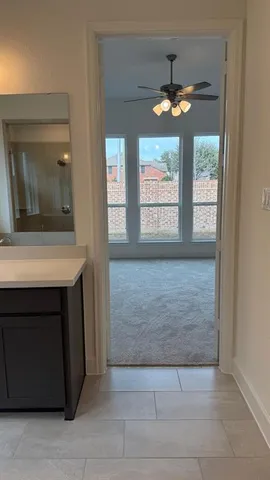 a kitchen with stainless steel appliances kitchen island granite countertop a stove a sink and a microwave