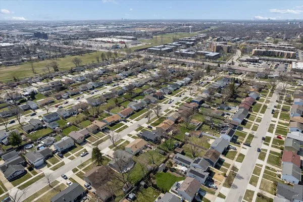 an aerial view of residential building and lake view