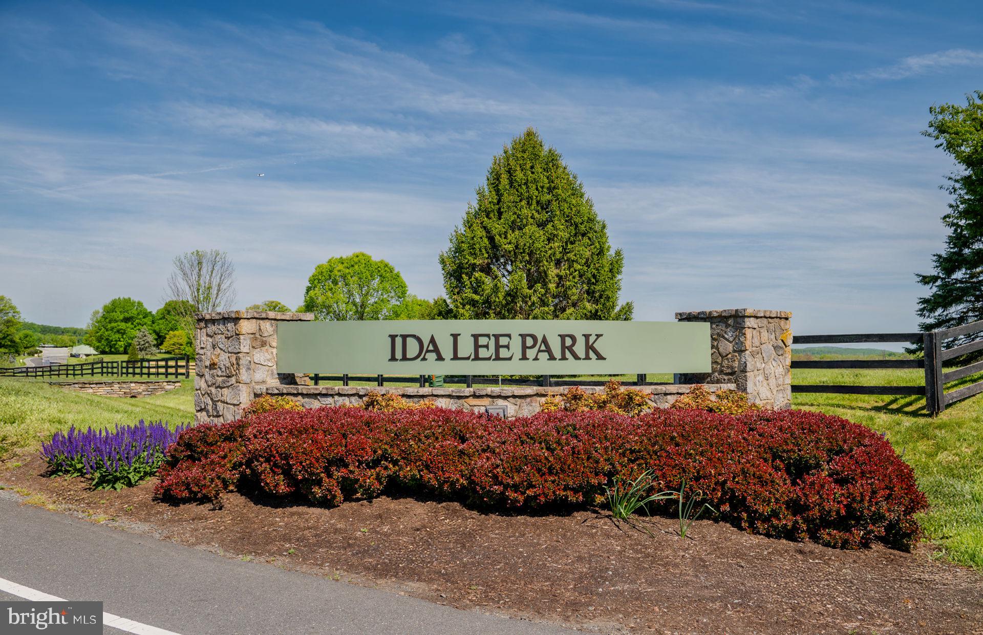 42851 Robins Perch Terrace Leesburg, VA 20176 - Photo 33 of 38 a front view of a house with a yard