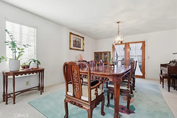 a view of a livingroom with furniture and a furniture