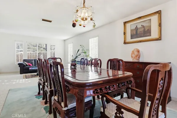 a view of entryway livingroom and hall with wooden floor