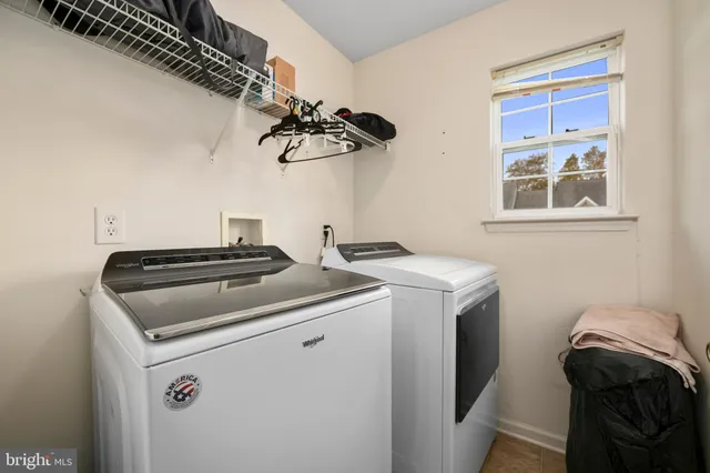 a view of outdoor sitting area with furniture