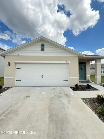 a view of garage with a large window