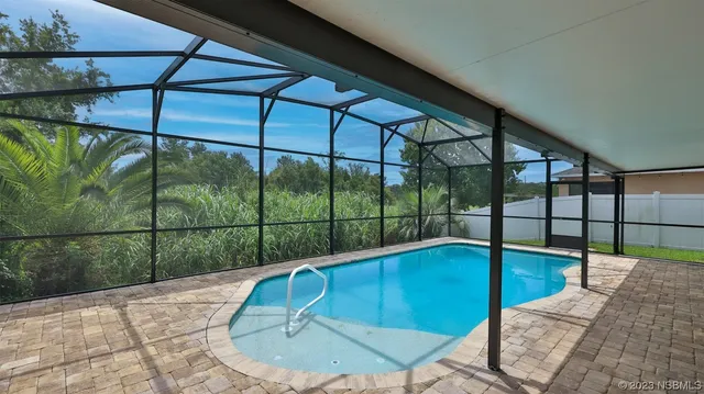 $615,000 | 441 White Coral Lane, New Smyrna Beach, FL 32168