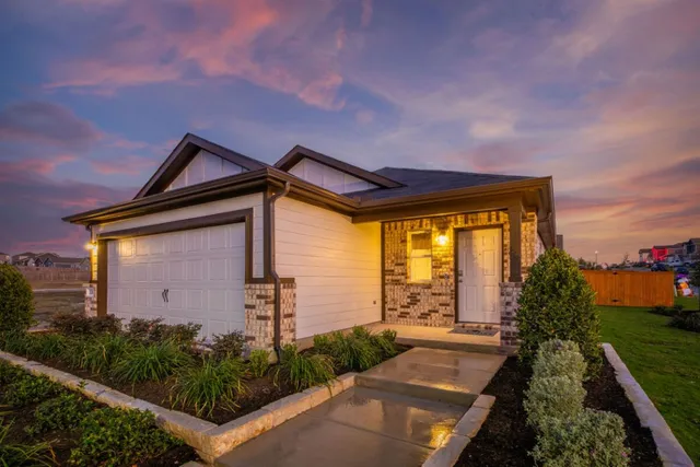 a house view with a garden space