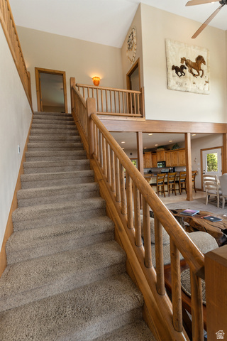 755 South Zion Ridge Drive Orderville, UT 84758 - Photo 48 of 84 Staircase with carpet floors and a ceiling fan
