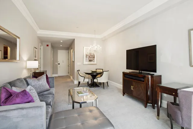 a view of a livingroom with furniture and window