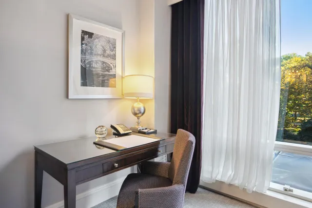 a room with a table and chairs