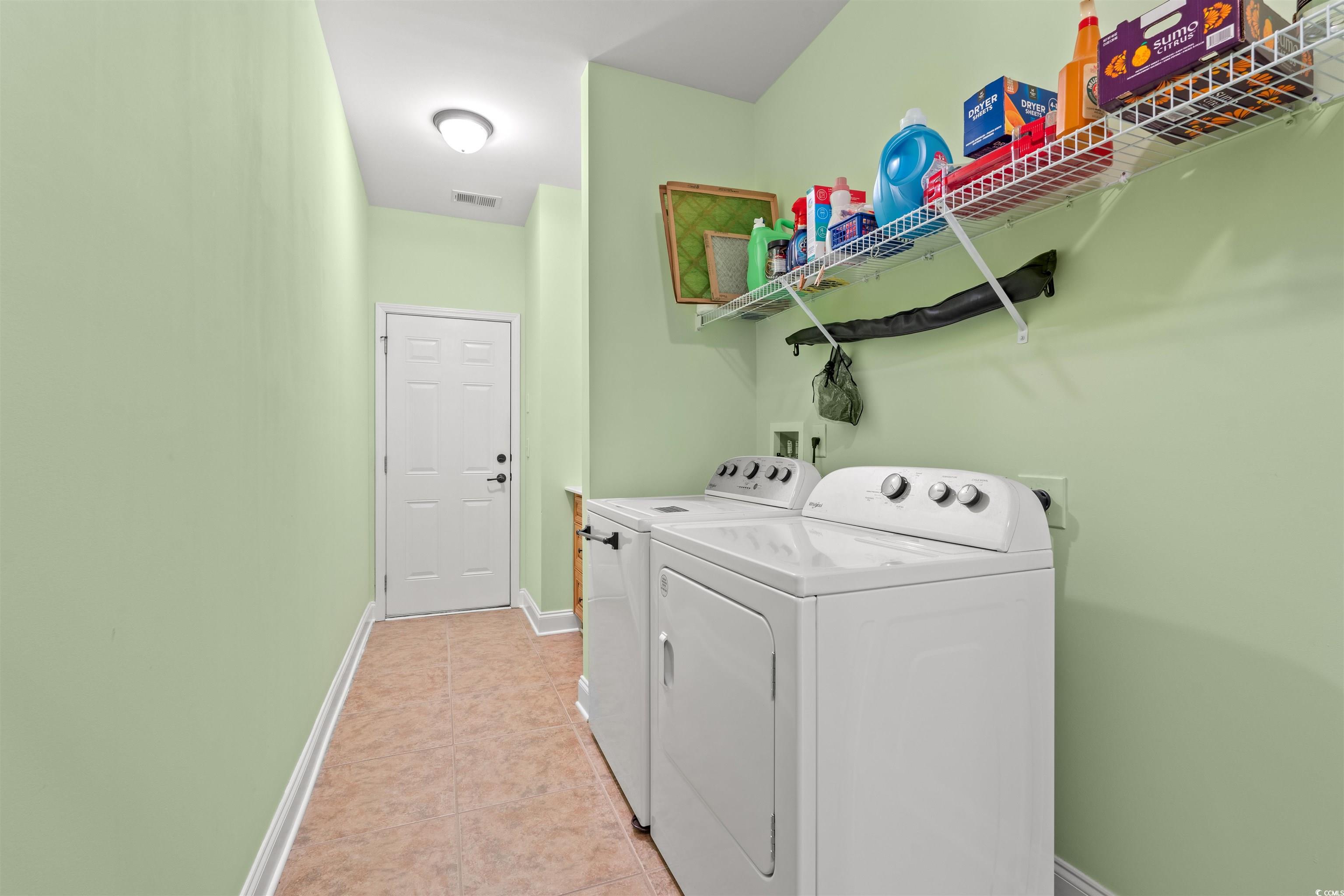 570 Botany Loop, Unit 570 Murrells Inlet, SC 29576 - Photo 18 of 36 Laundry room featuring light tile patterned flooring, separate washer and dryer, laundry area, baseboards, and visible vents