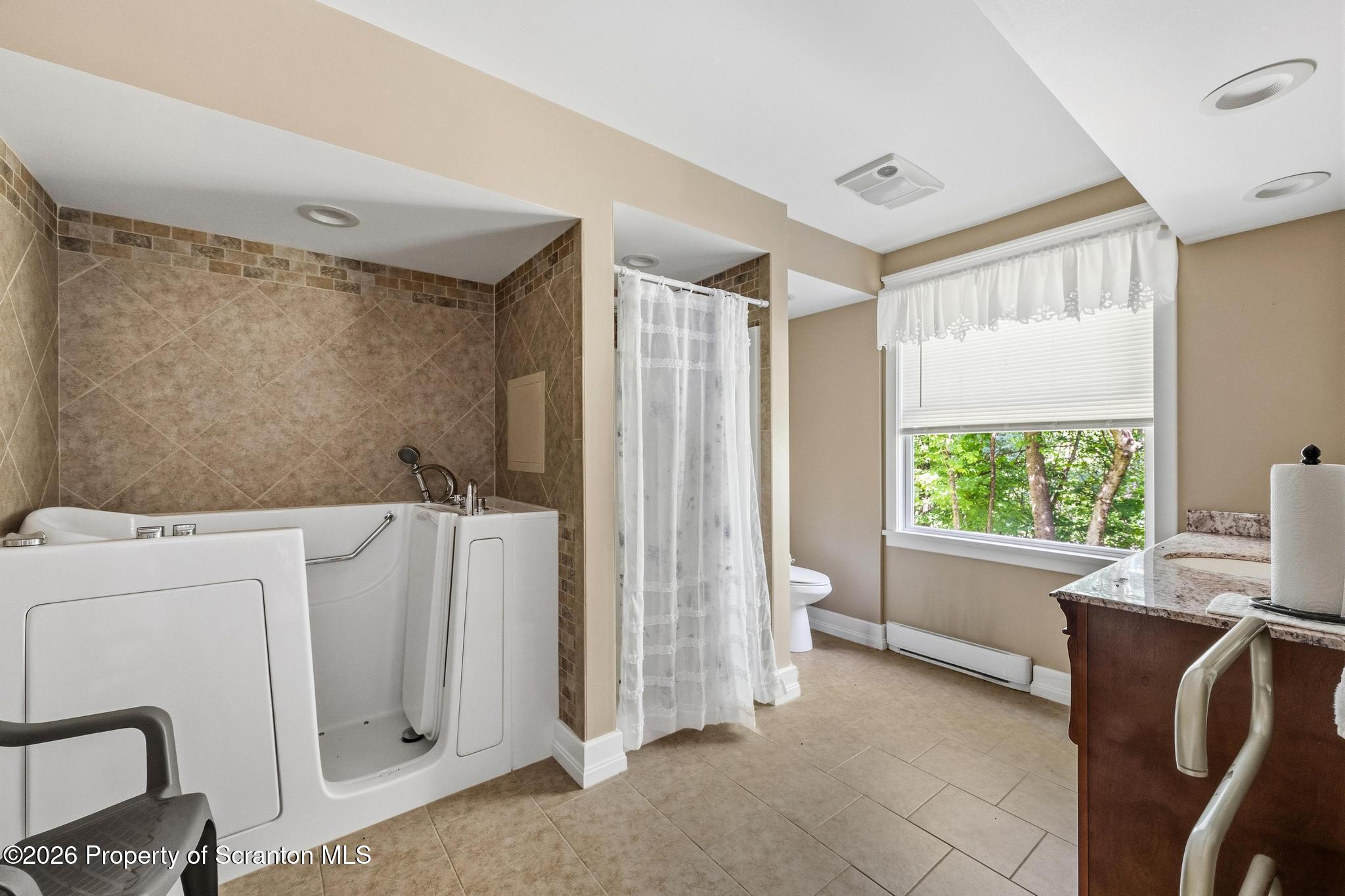 112 Spring Hill Drive Hunlock Creek, PA 18621 - Photo 24 of 54 With sit down shower/tub