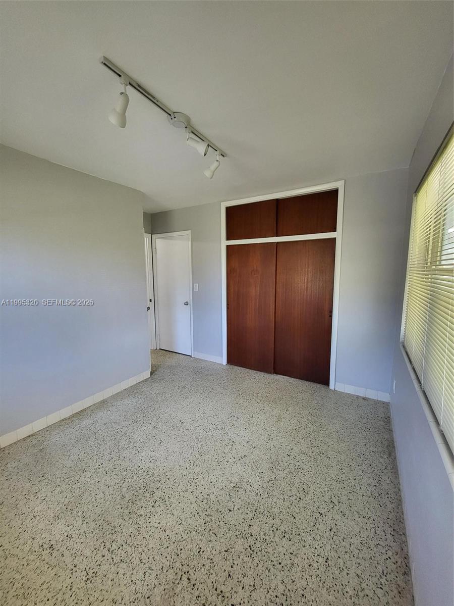 200 Southeast 3rd Street, Unit 2 Dania Beach, FL 33004 - Photo 3 of 5 a view of an empty room