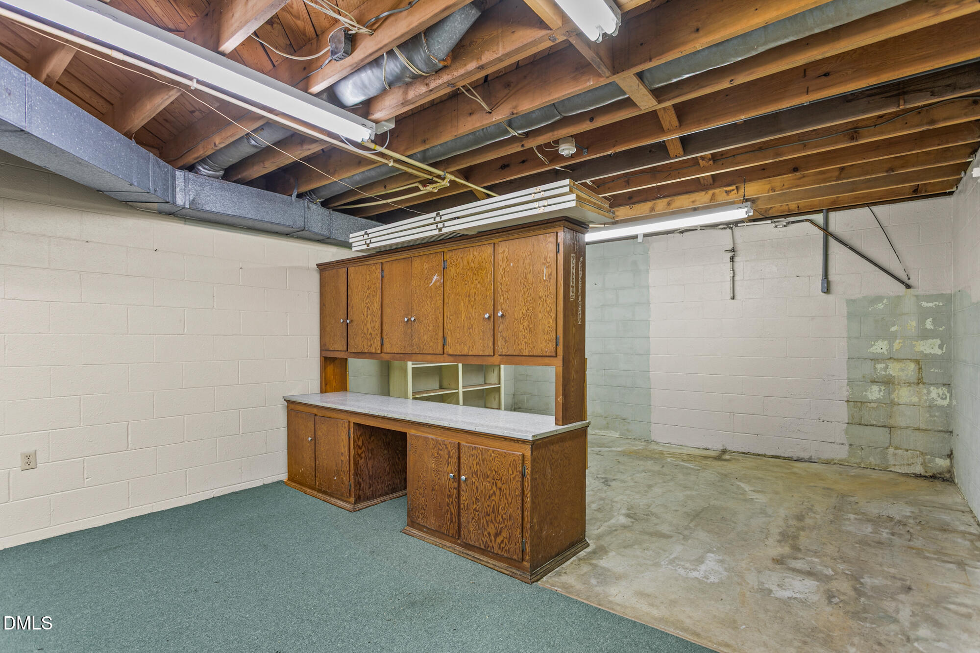 7201 Efland - Cedar Grove Road Cedar Grove, NC 27231 - Photo 45 of 70 a view of a room with wooden cabinets