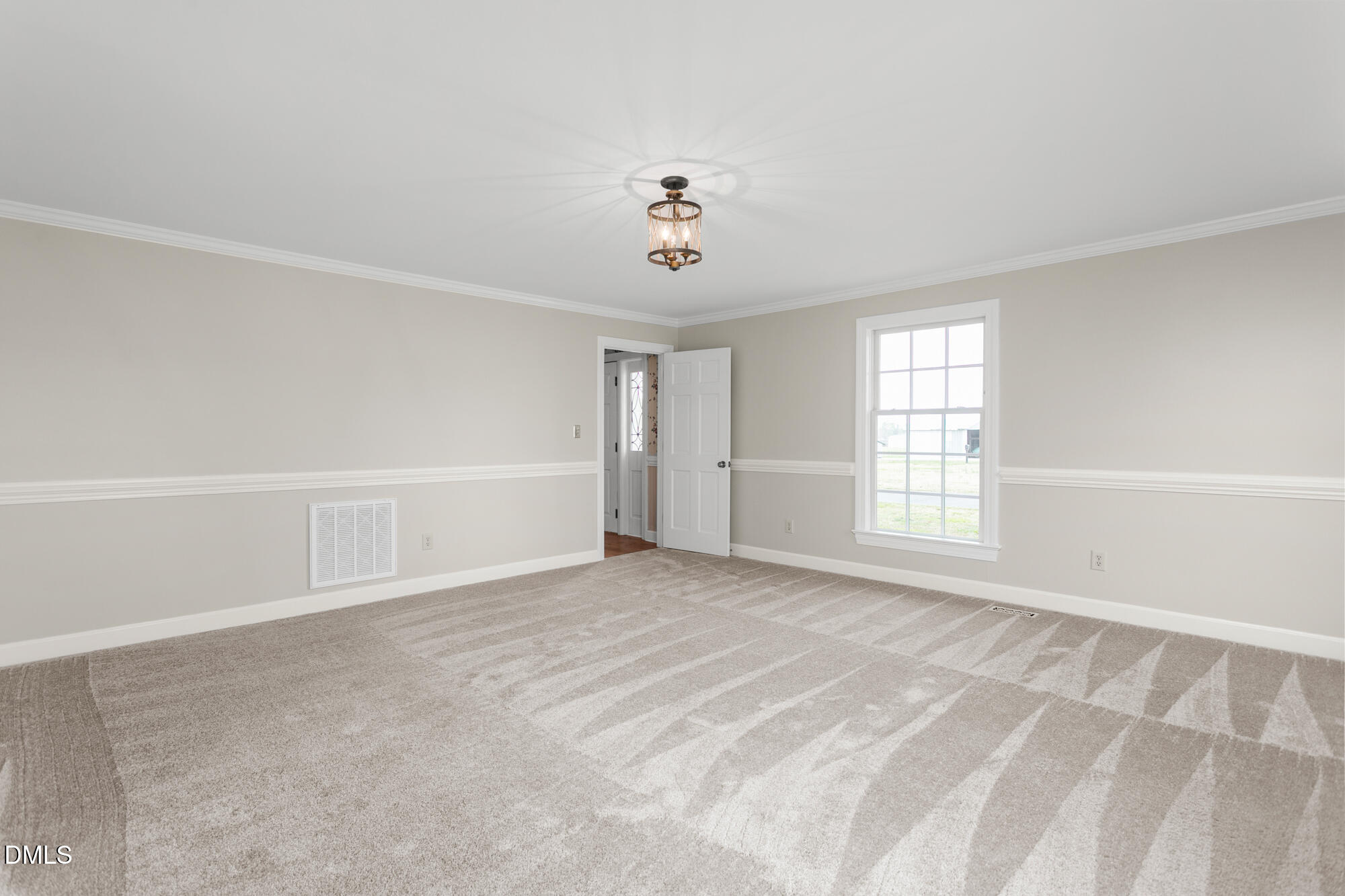 7201 Efland - Cedar Grove Road Cedar Grove, NC 27231 - Photo 9 of 70 a view of an empty room with a window