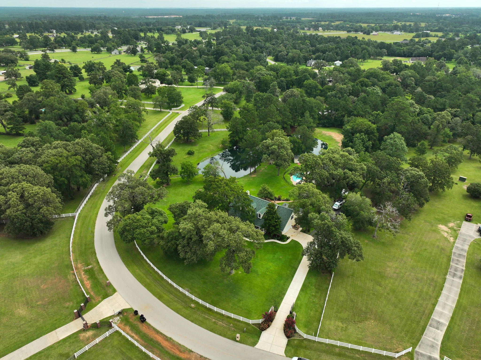 34310 High Point Drive Magnolia, TX 77355 - Photo 43 of 48 Stunning aerial view showcasing the sprawling layout and natural beauty of the property.