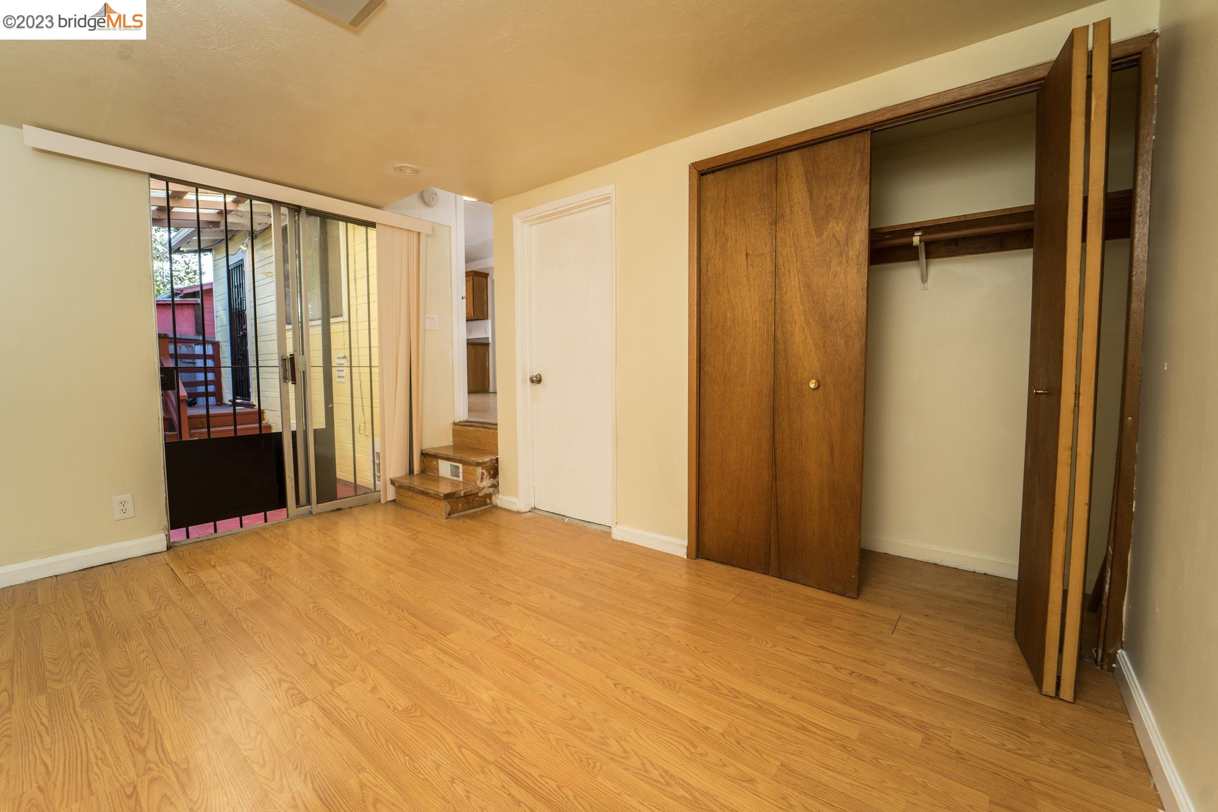 2205 Curtis Street Berkeley, CA 94702 - Photo 11 of 38 a view of an empty room with a window