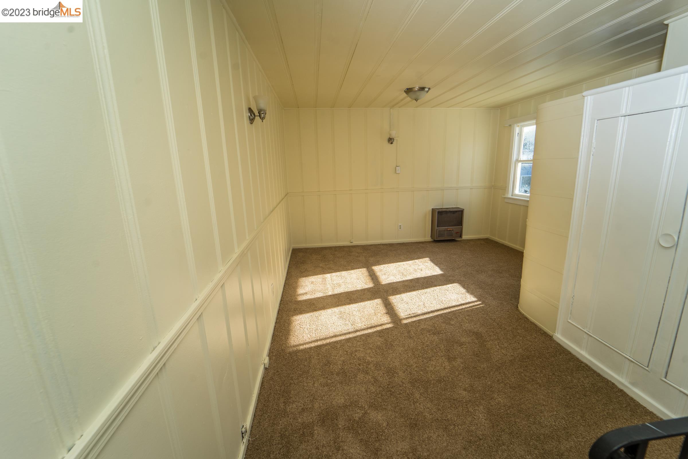 2205 Curtis Street Berkeley, CA 94702 - Photo 24 of 38 a bathroom with a window