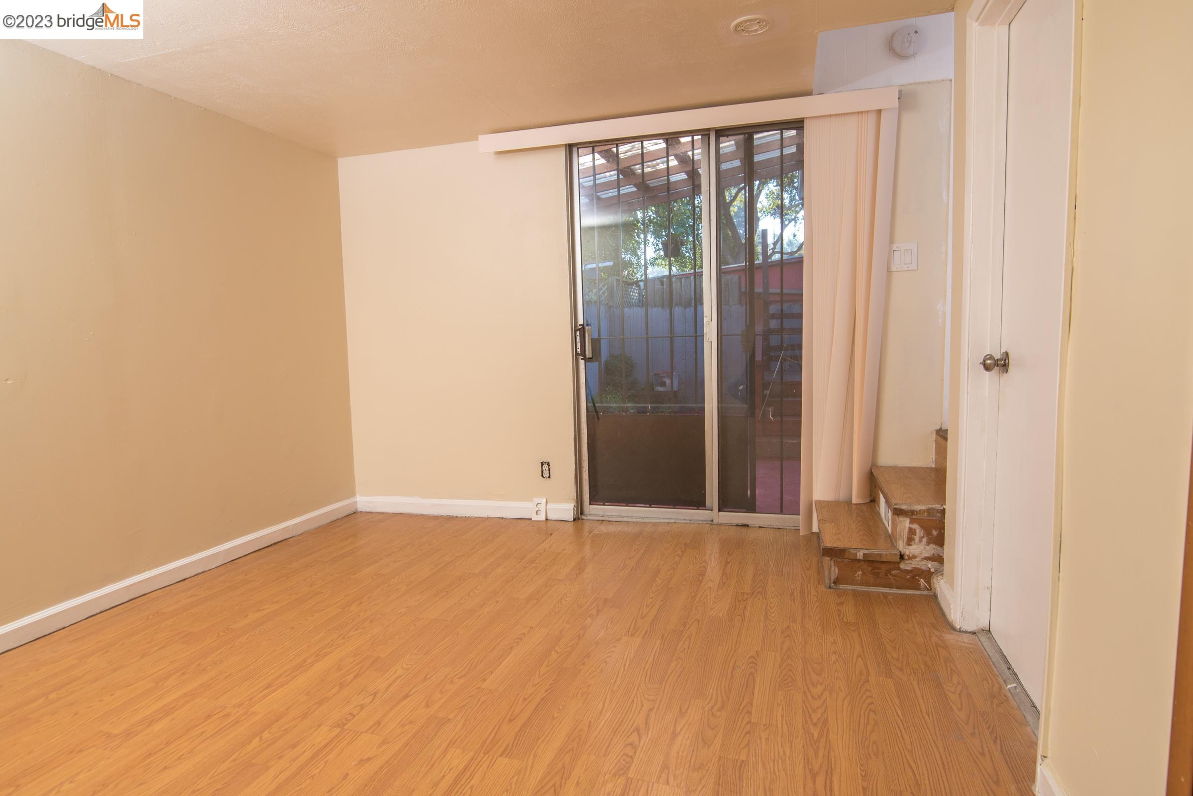 2205 Curtis Street Berkeley, CA 94702 - Photo 9 of 38 a view of an empty room with a window