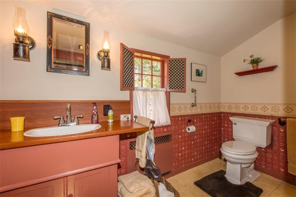 49 Meadow Cove Road Boothbay, ME 04544 - Photo 15 of 35 The first floor bathroom with tile...