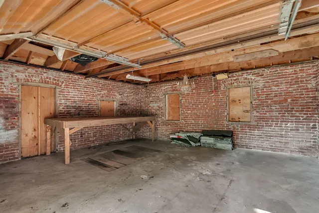 a view of a hallway with stairs