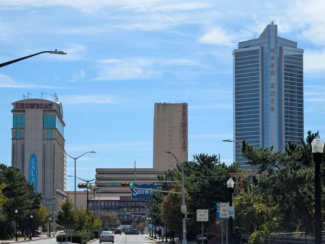 a view of a building with a yard