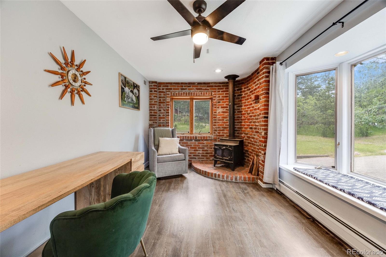 8783 Ault Lane Morrison, CO 80465 - Photo 28 of 40 a very nice looking room with a large window