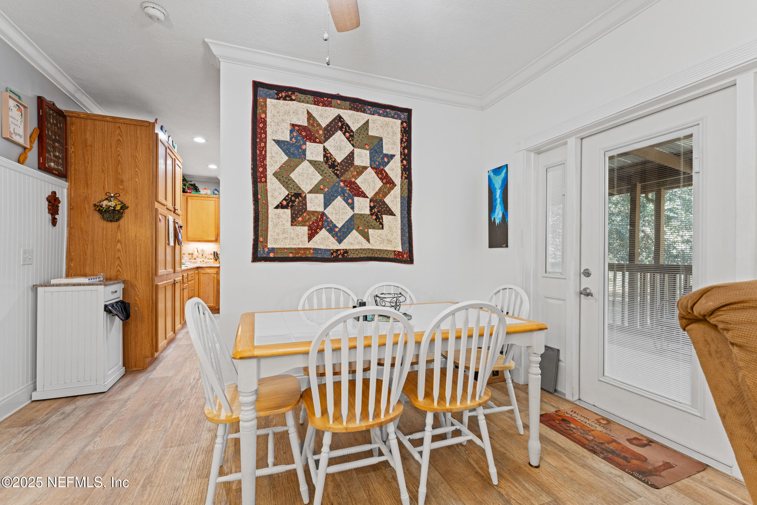 1463 Bardin Road Palatka, FL 32177 - Photo 20 of 61 a view of a dining room with furniture and a window