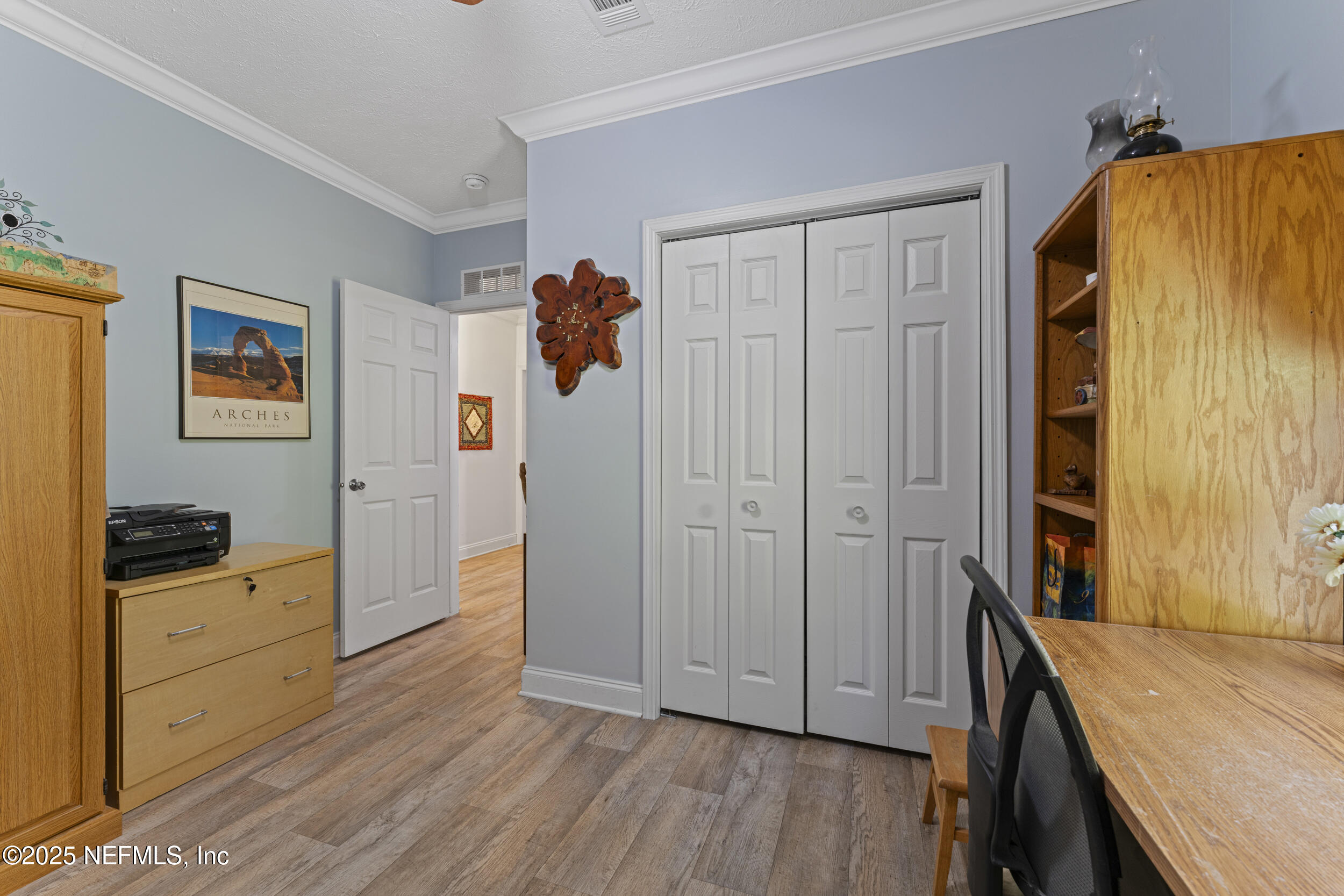 1463 Bardin Road Palatka, FL 32177 - Photo 28 of 61 a view of a storage & utility room with closet wooden floor